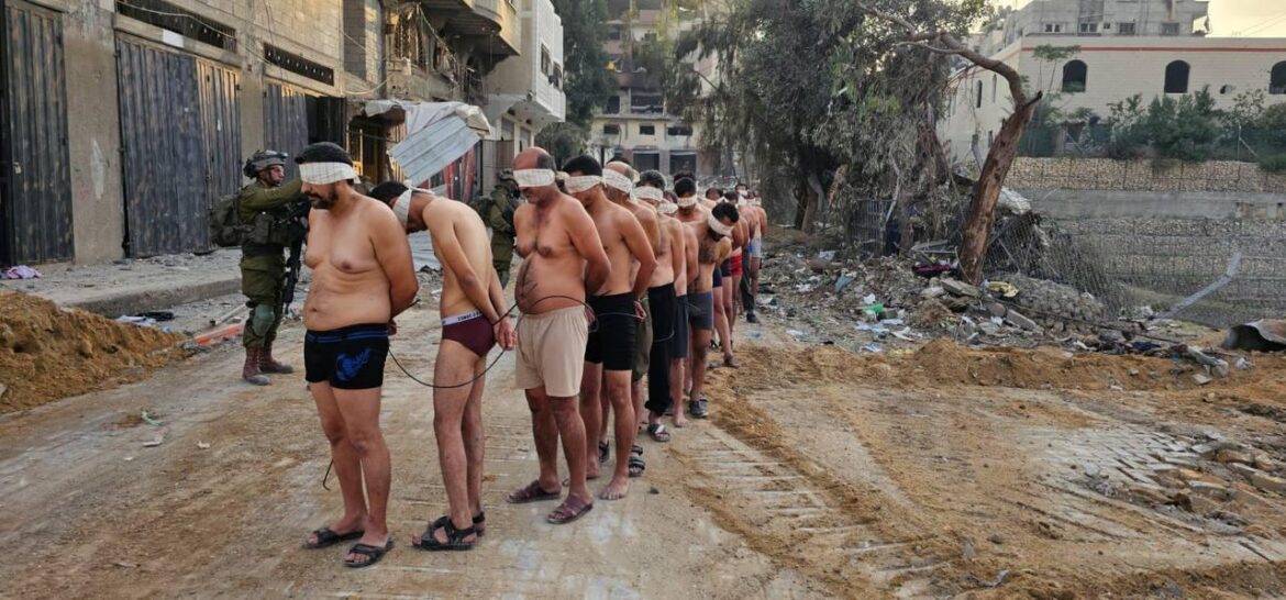 Dozens of Men Stripped to Underwear