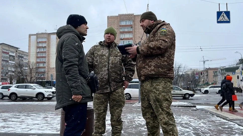Exhausted Ukraine struggles to find new men for front line